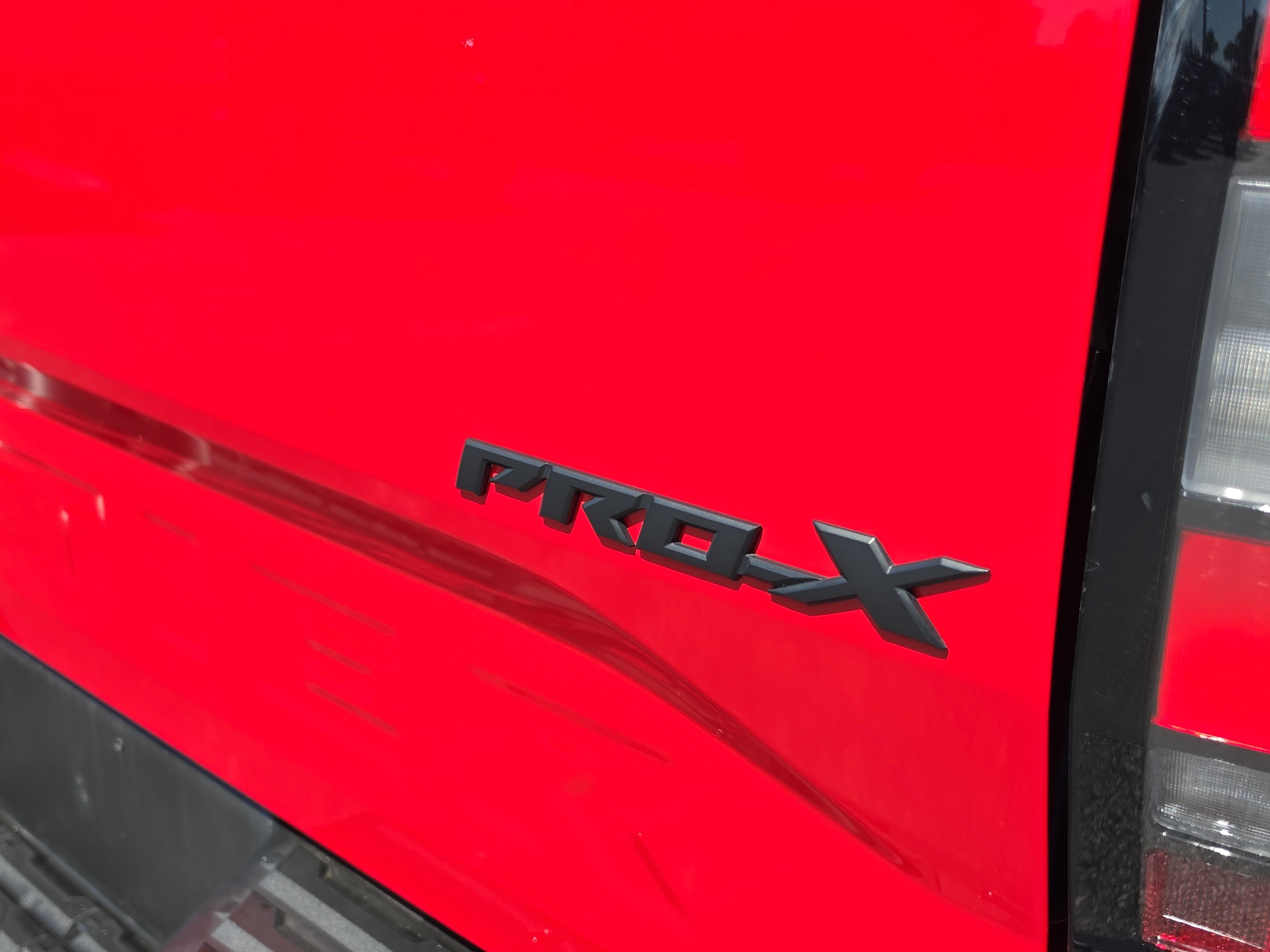 Used 2023 Red Nissan Crew Cab PRO-X 4x2 image 8