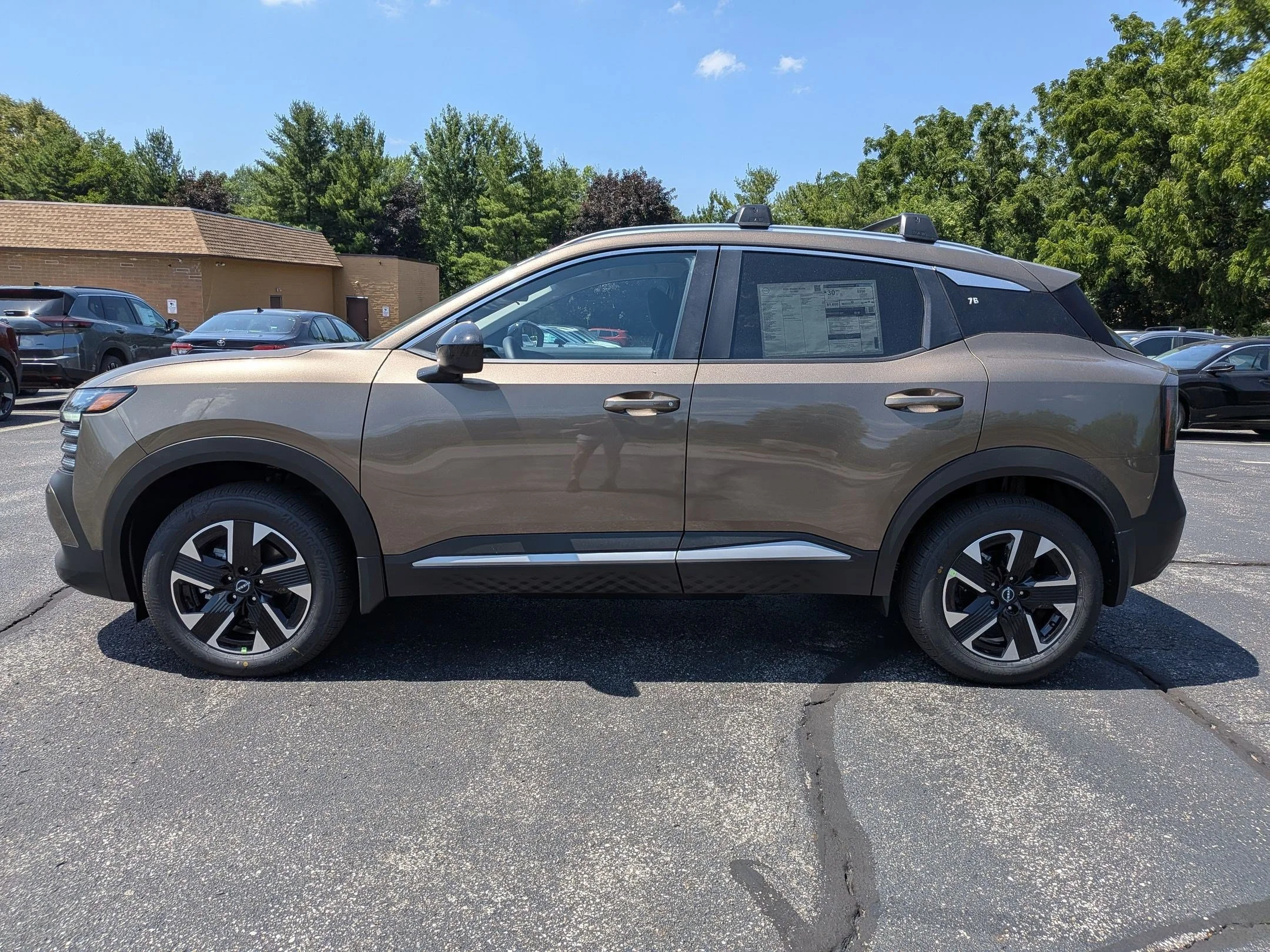 New 2026 Bronze Metallic Nissan SV image 9