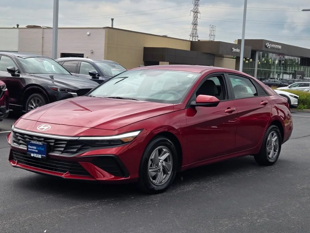 Certified Used 2025 Red Hyundai SE image 1