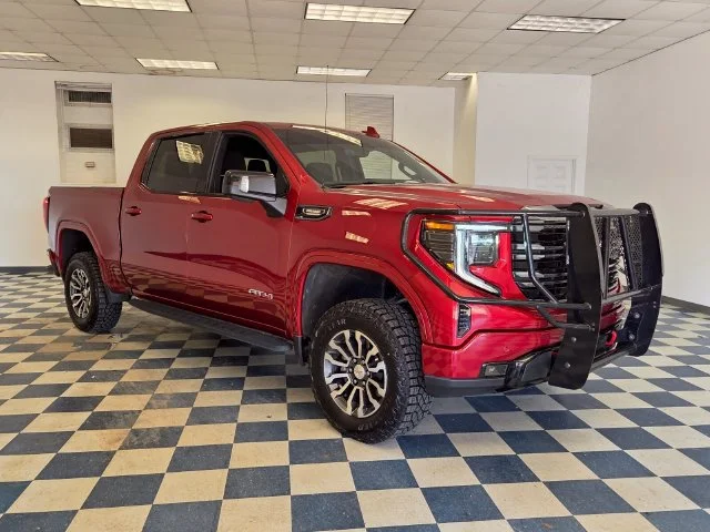 Used 2023 VOLCANIC RED TINTCOAT GMC AT4 image 1