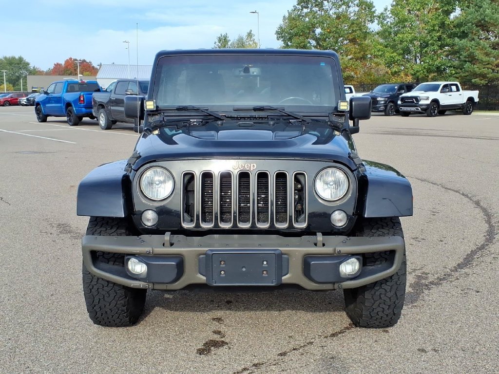 Used 2016 Jeep Wrangler Unlimited 75th Anniversary Edition with VIN 1C4BJWEG4GL319358 for sale in Richmond, MI