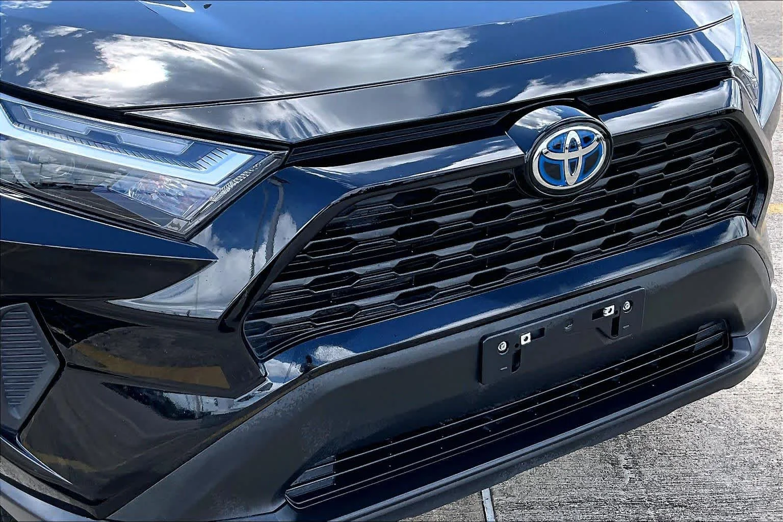 Used 2024 Midnight Black Metallic Toyota Hybrid LE image 29