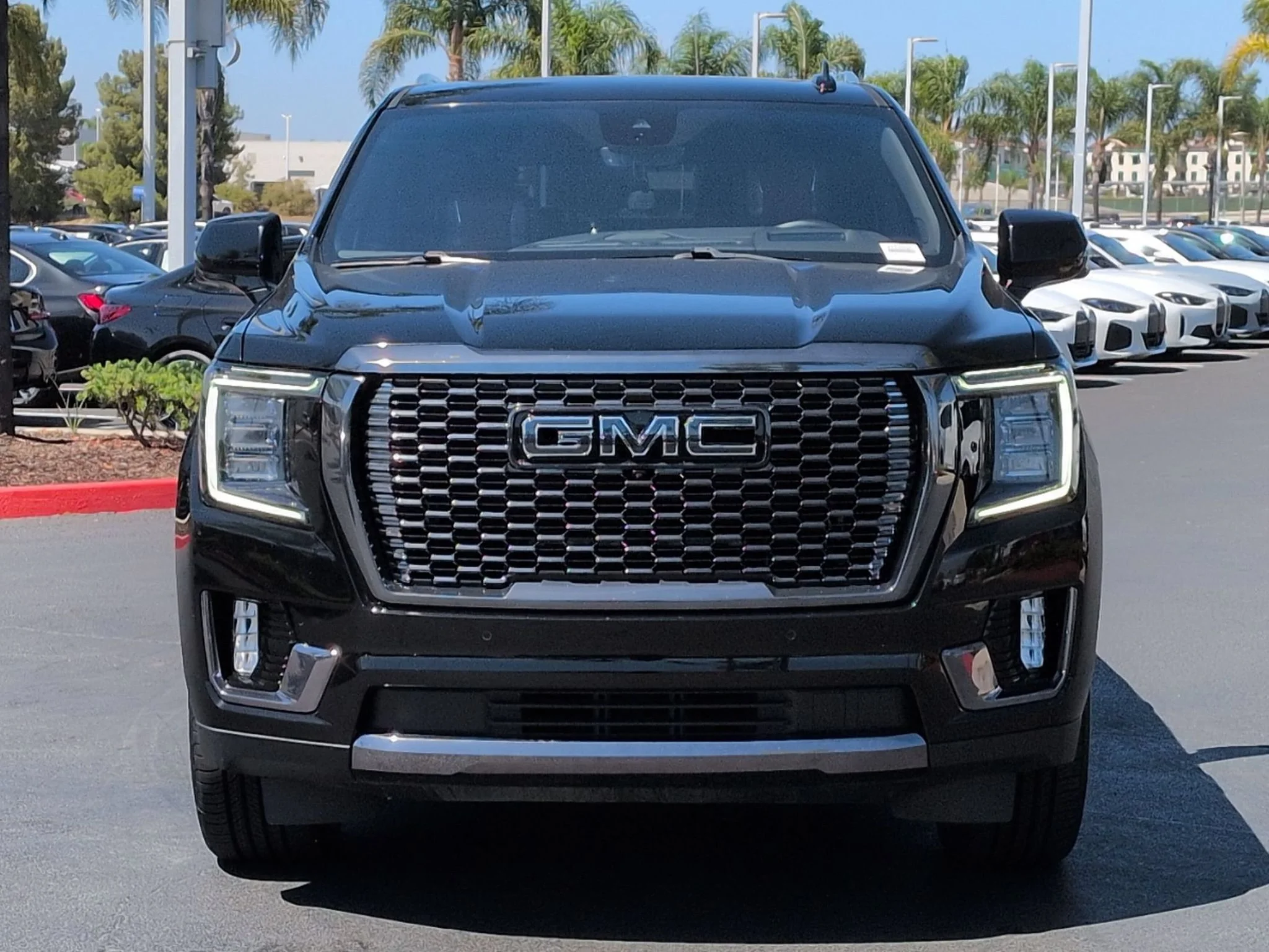 Used 2024 ONYX BLACK GMC Denali Ultimate image 2