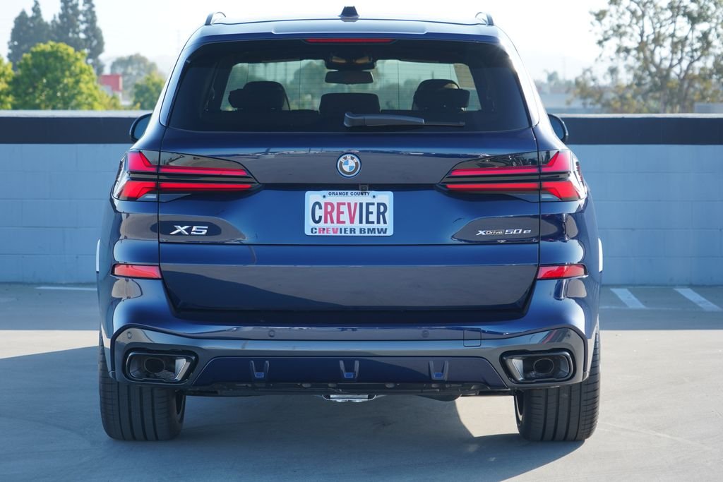 New 2026 Tanzanite Blue II Metallic BMW xDrive50e image 7