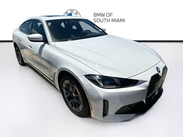 Certified Used 2025 White BMW eDrive40 image 1