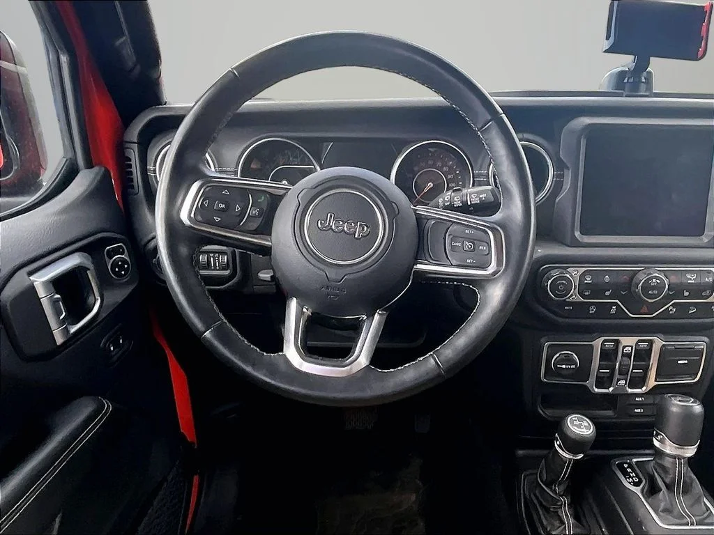 Used 2018 Orange Jeep Unlimited Sahara image 5