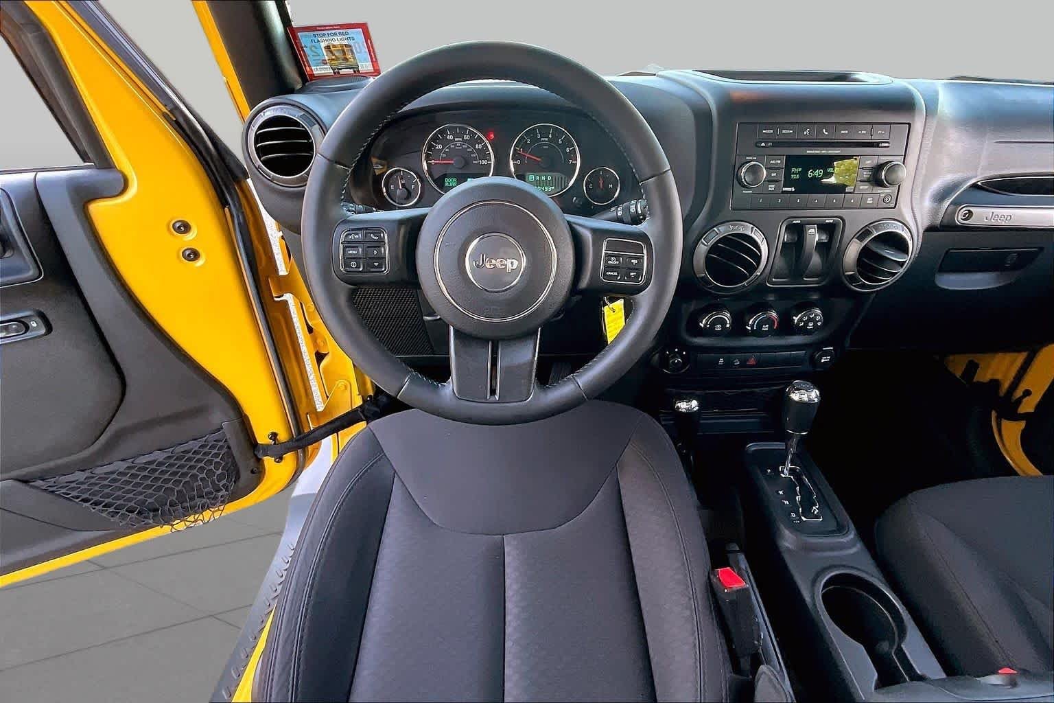 Used 2015 Baja Yellow Clearcoat Jeep Sport image 6