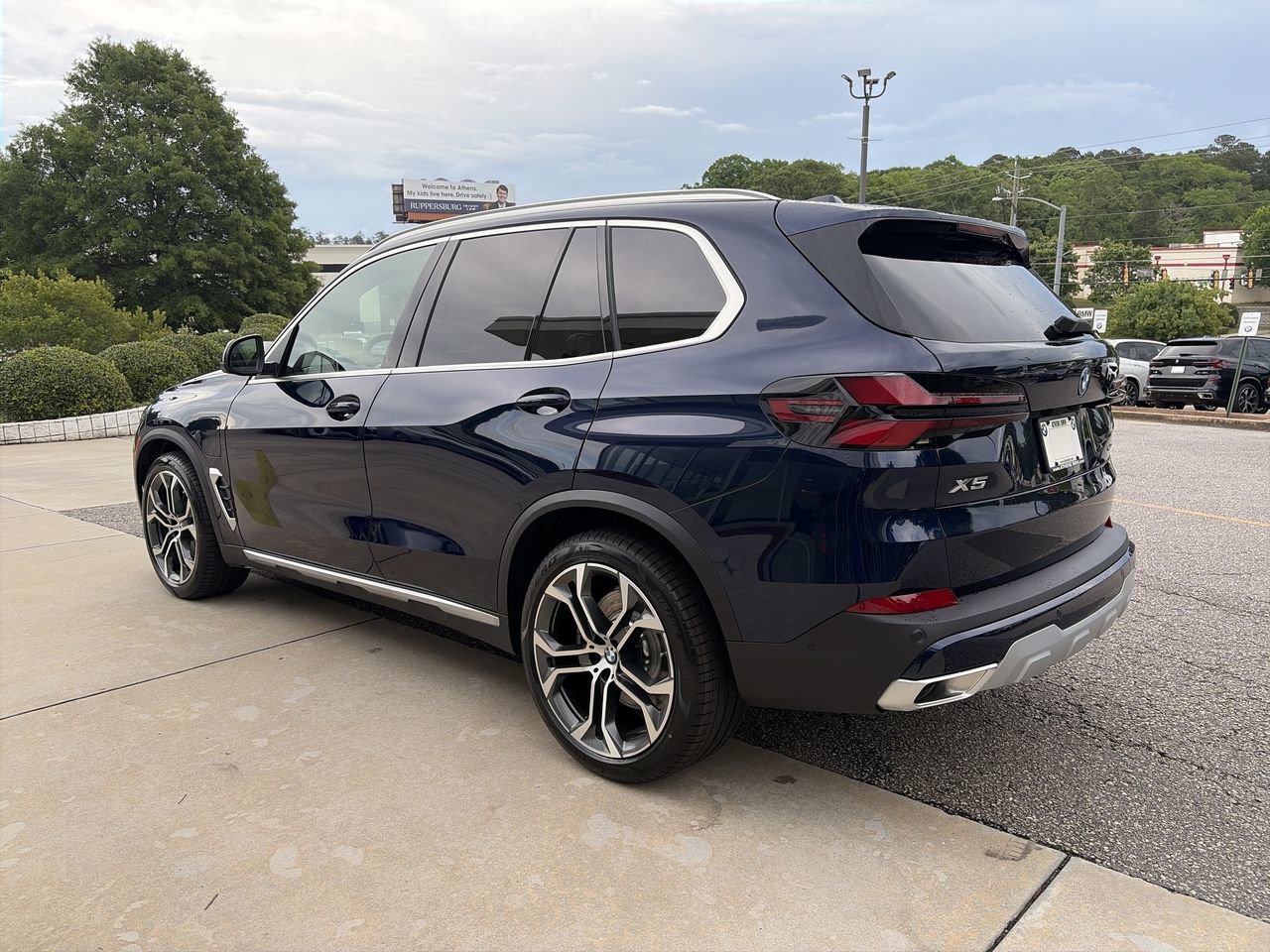 New 2026 Tanzanite Blue II Metallic BMW xDrive50e image 6