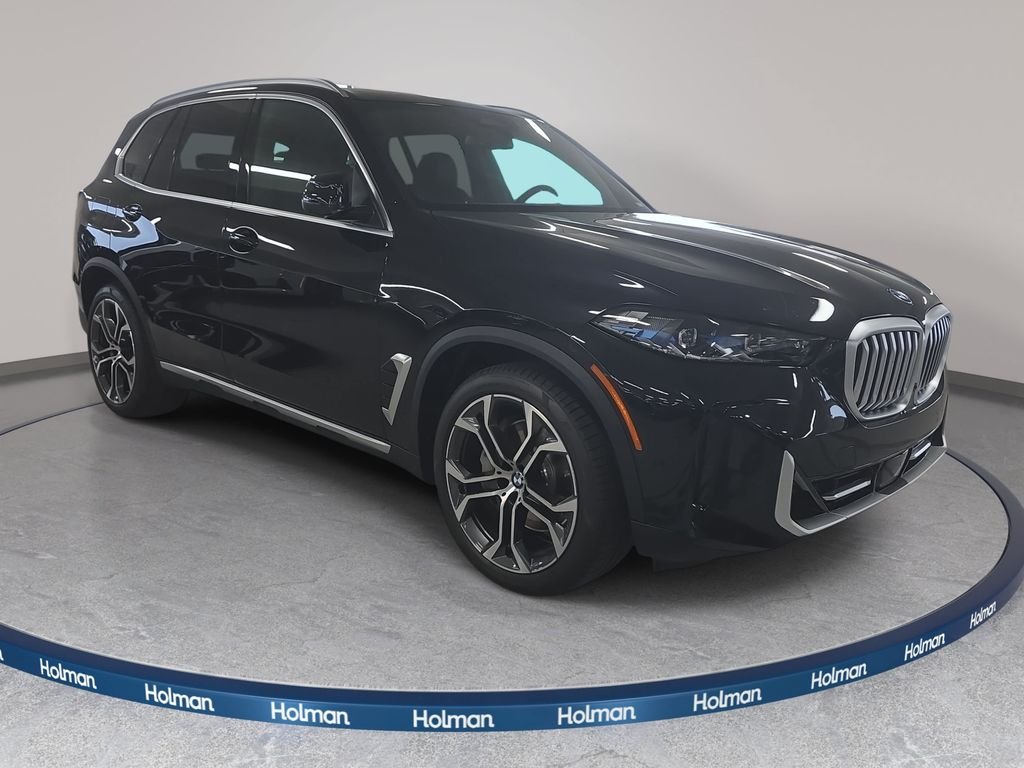 New 2026 Black Sapphire Metallic BMW xDrive50e image 3