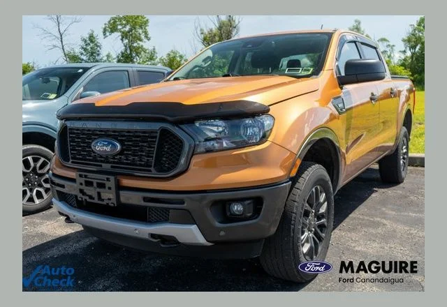 Used 2019 Orange Ford XLT image 1