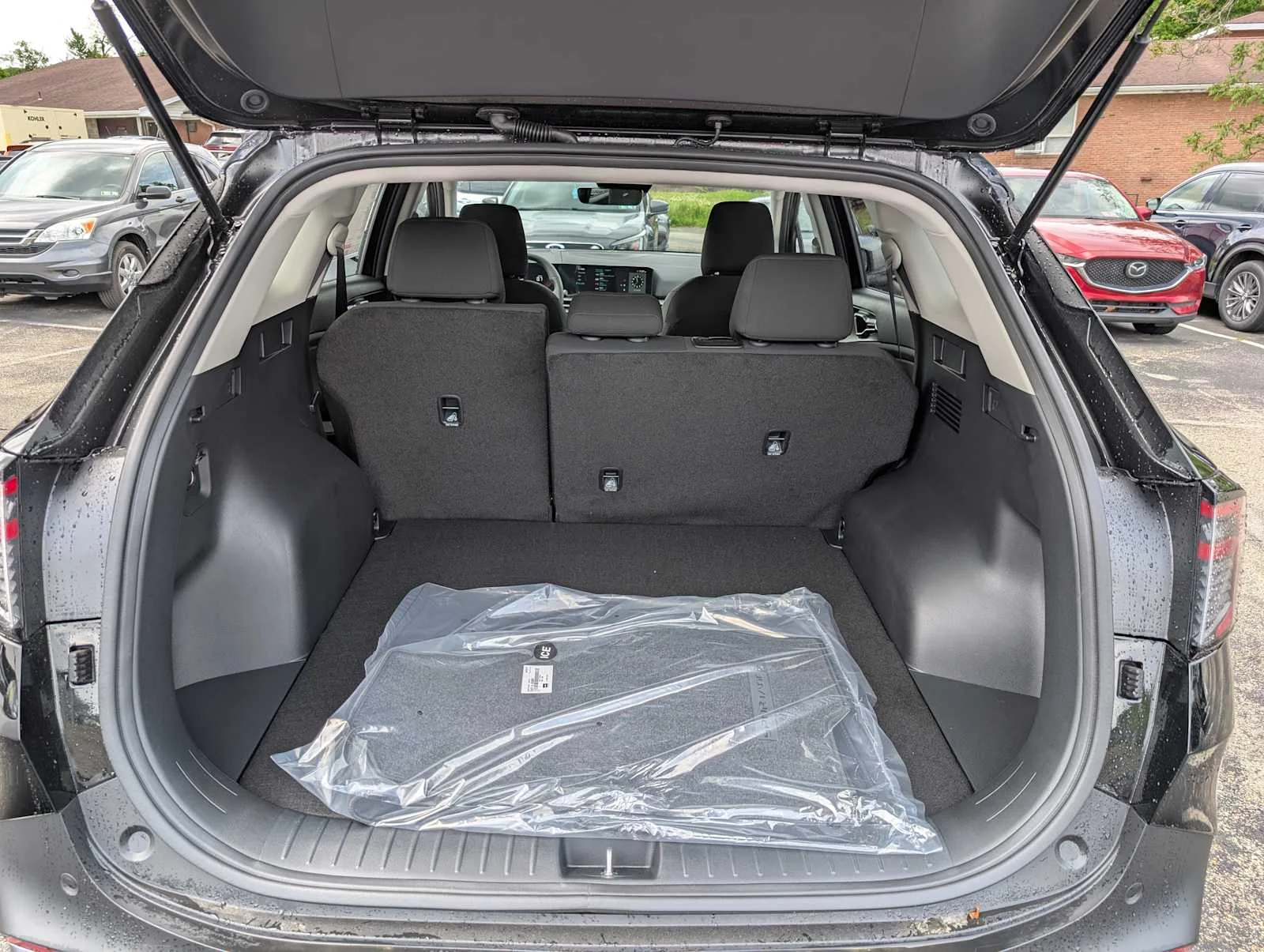 New 2026 Ebony Black Kia LX image 7