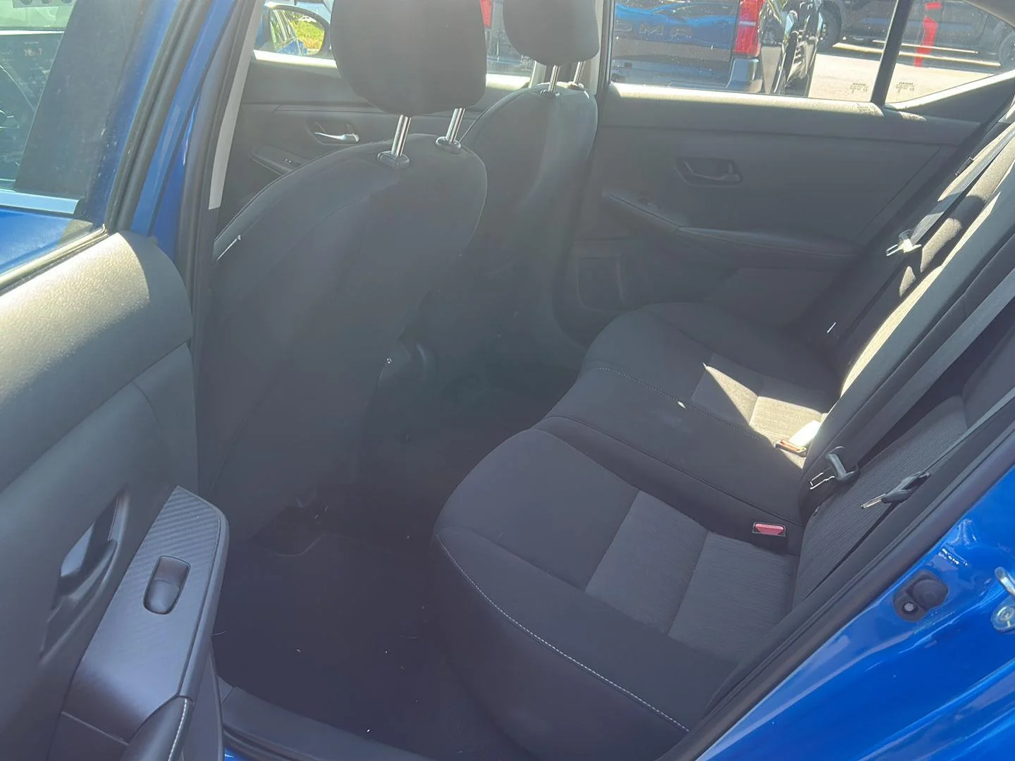 Used 2024 Electric Blue Metallic Nissan SV image 5