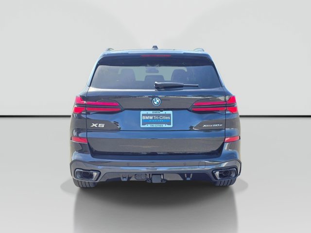 New 2026 Black Sapphire Metallic BMW xDrive50e image 5