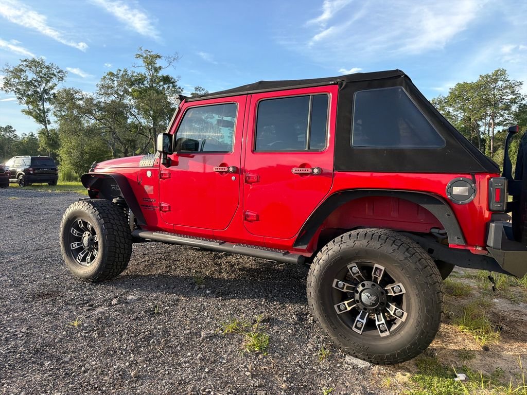 Used 2015 Red Jeep Unlimited Sport image 8