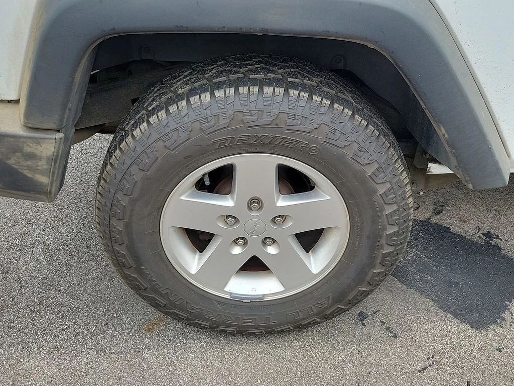 Used 2012 White Jeep Sport image 5