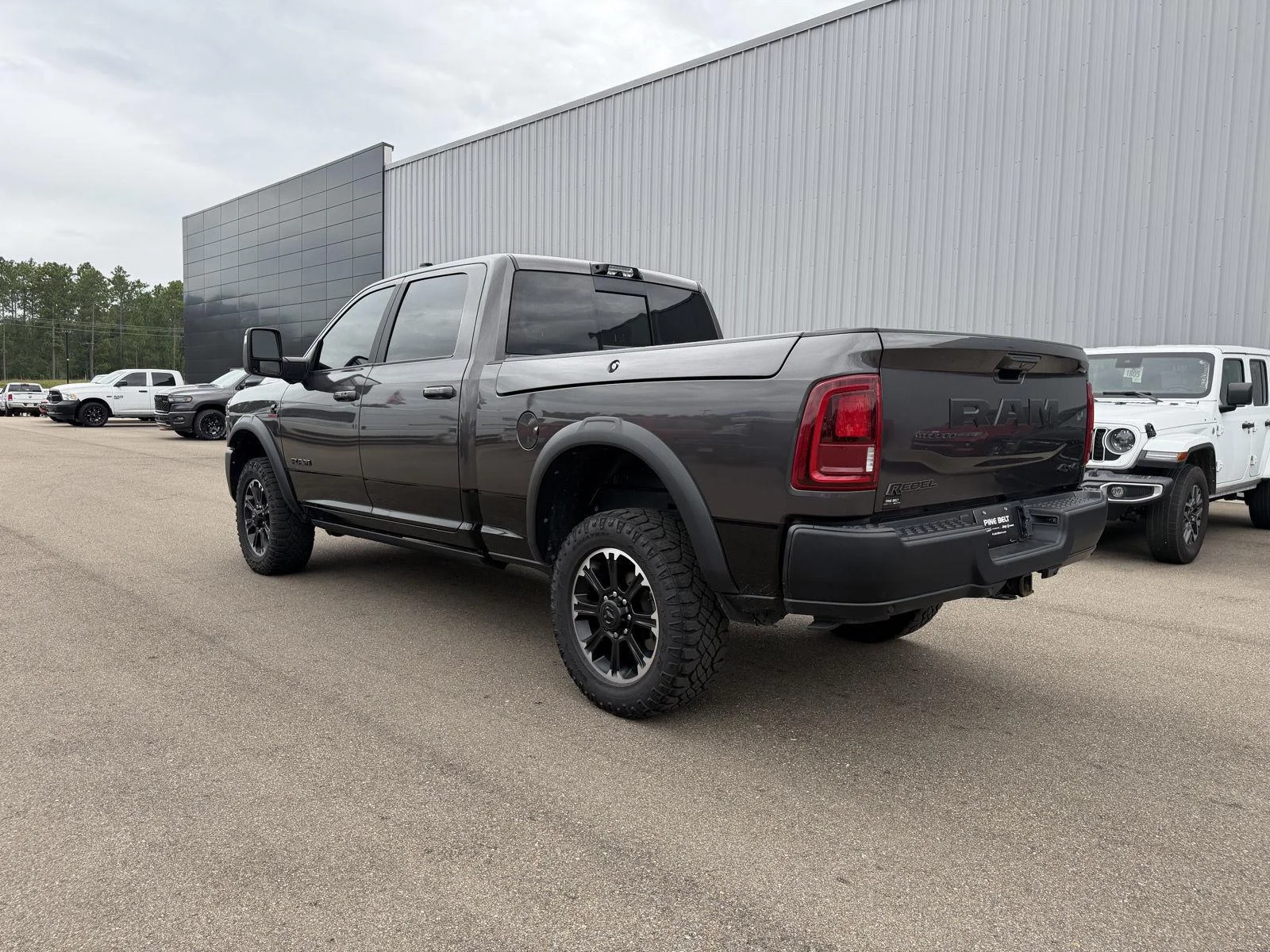 Used 2025 Granite Crystal Metallic Clearcoat Ram Rebel image 4