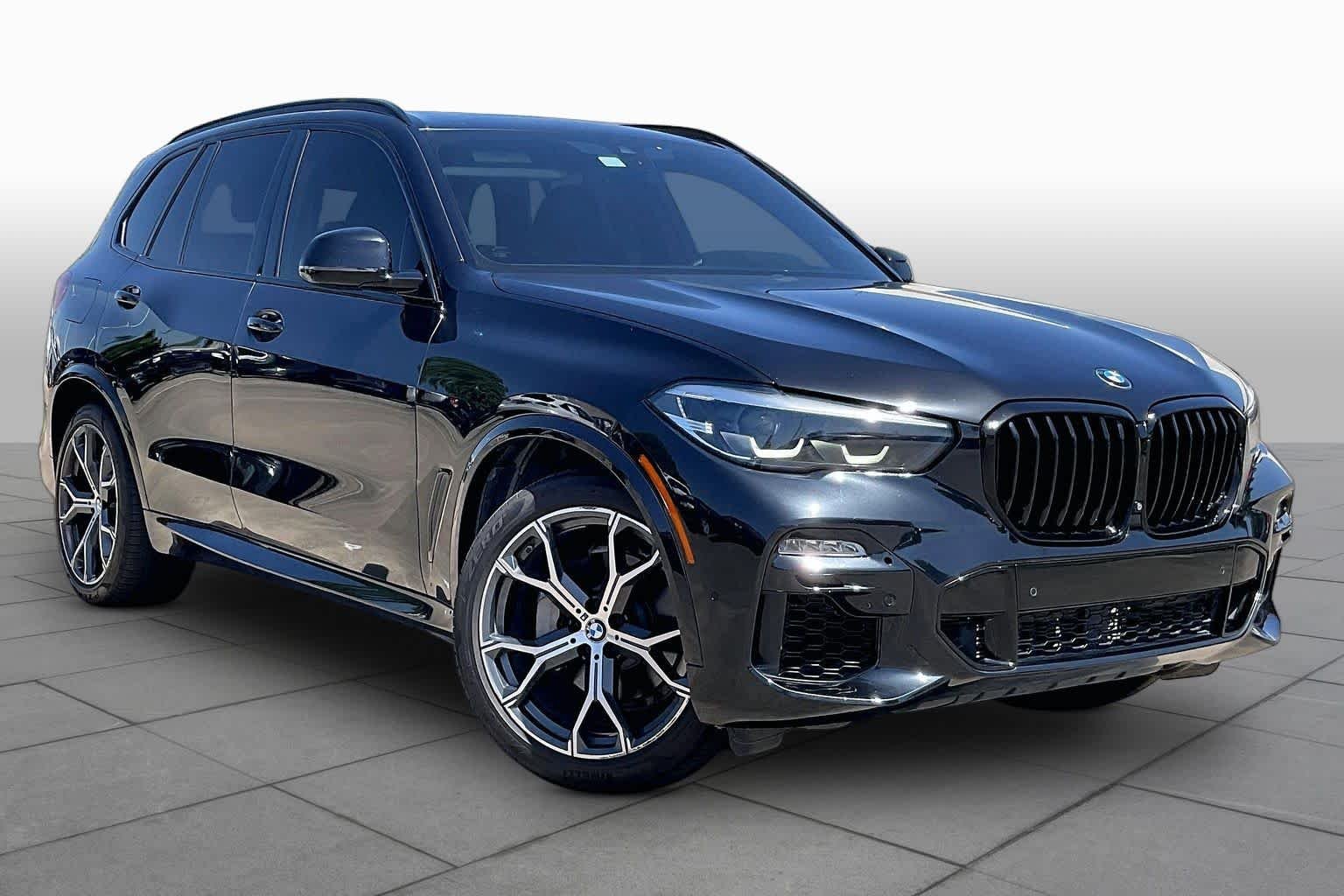 Used 2021 Black Sapphire Metallic BMW sDrive40i image 3
