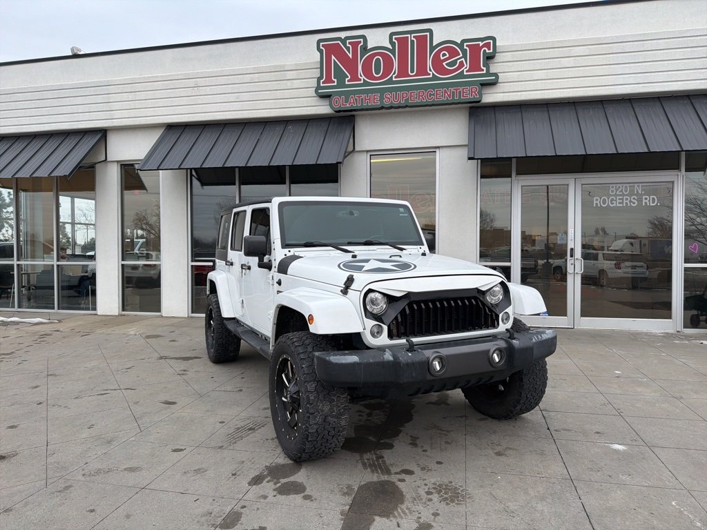 Used 2017 Jeep Wrangler Unlimited Freedom Edition with VIN 1C4BJWDG3HL563439 for sale in Kansas City