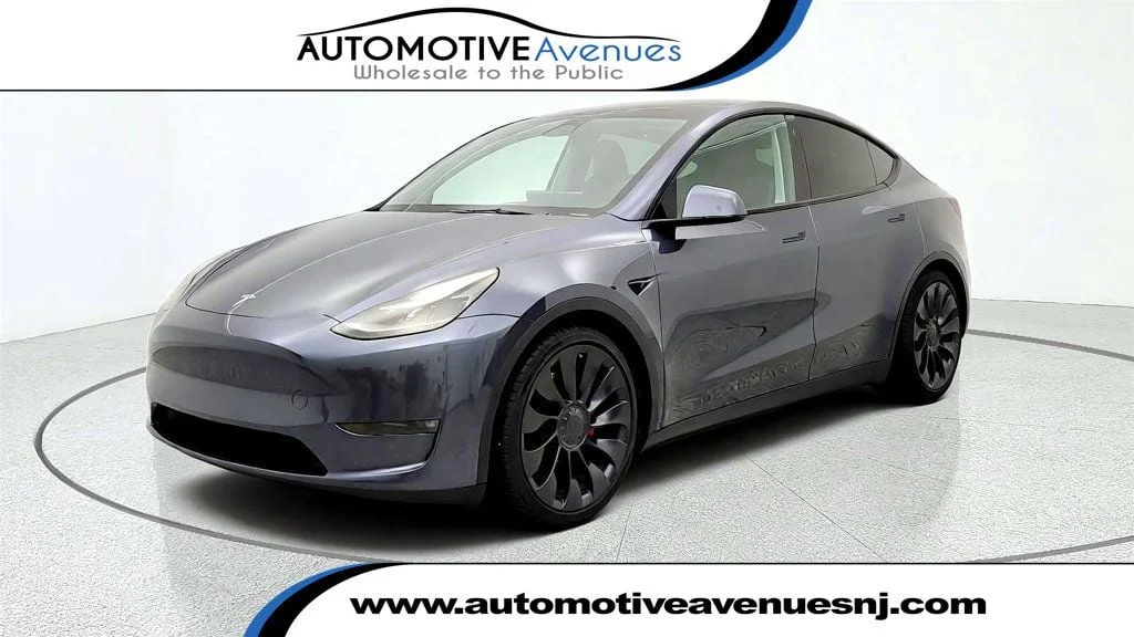 Used 2022 Midnight Silver Metallic Tesla Performance AWD image 1