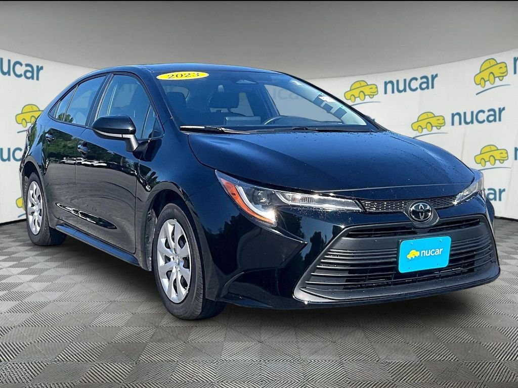 Used 2023 Black Toyota LE image 1
