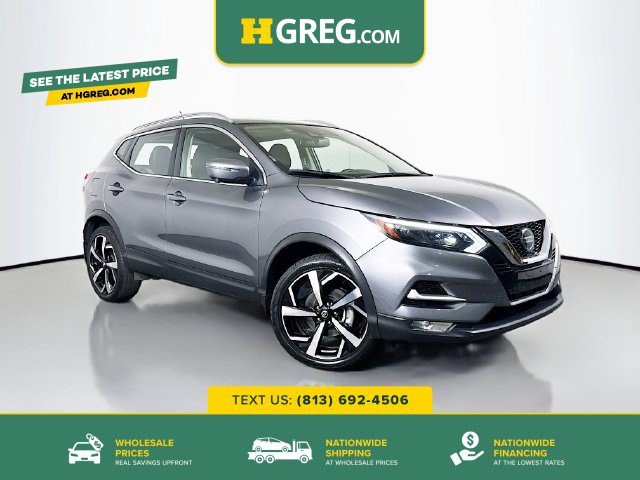 Used 2022 Gun Metallic Nissan SL image 1