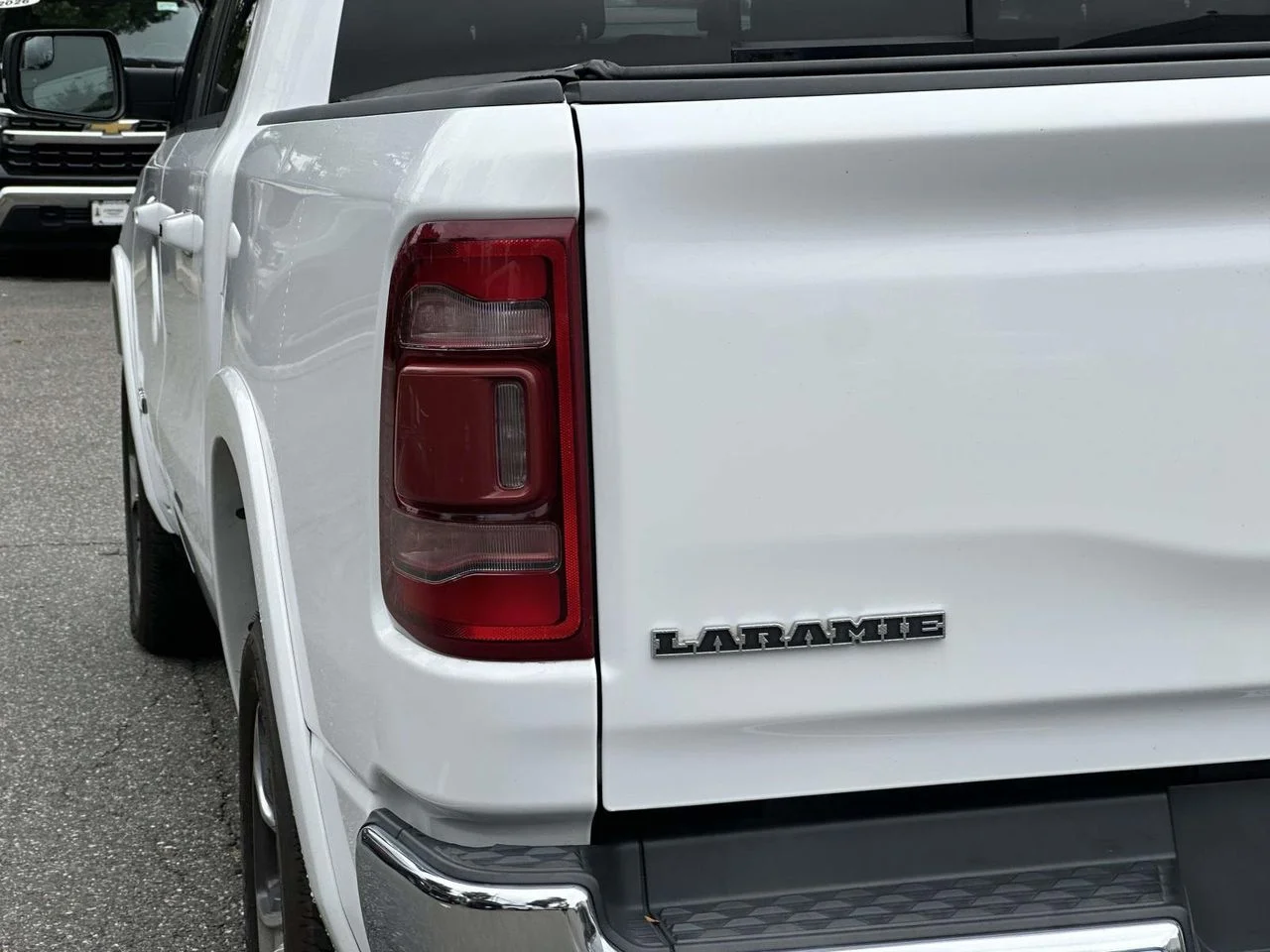 Used 2021 Bright White Clearcoat RAM Laramie Crew Cab 4x4 57