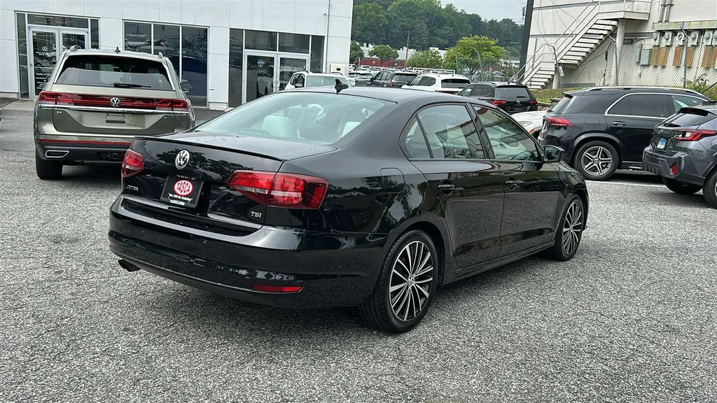 Used 2016 Black Volkswagen 1.8T Sport image 4