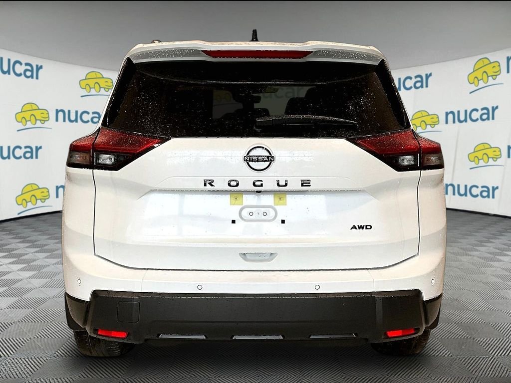 New 2026 White Nissan Dark Armor image 4