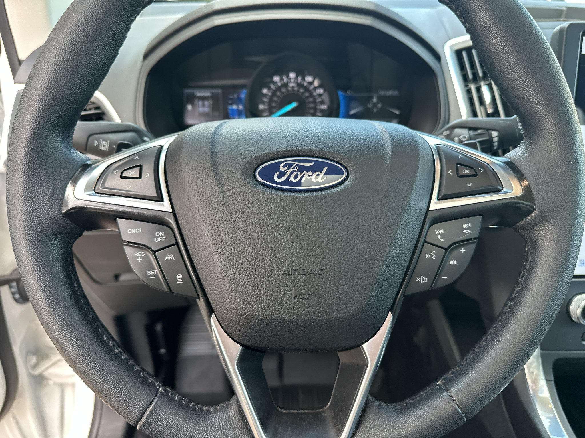 Used 2024 Star White Metallic Tri-Coat Ford Titanium image 17