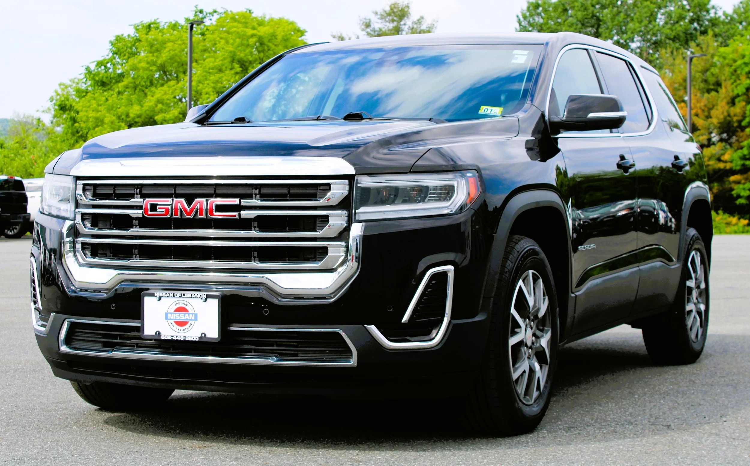 Used 2021 Ebony Twilight Metallic GMC SLE image 1