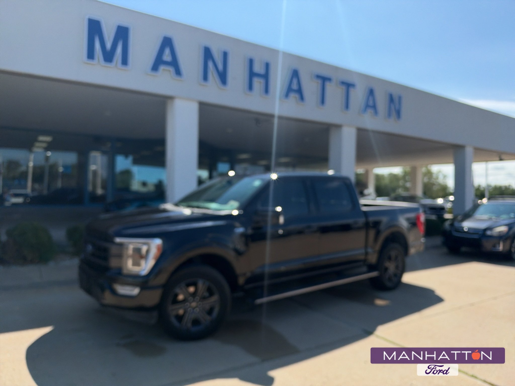 Used 2023 Agate Black Metallic Ford LARIAT image 1