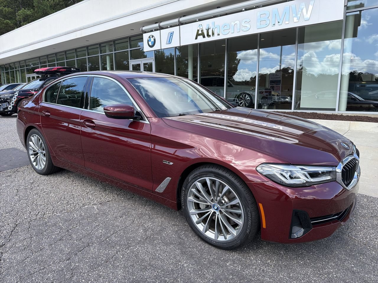Used 2023 Aventurin Red Metallic BMW 530e image 1