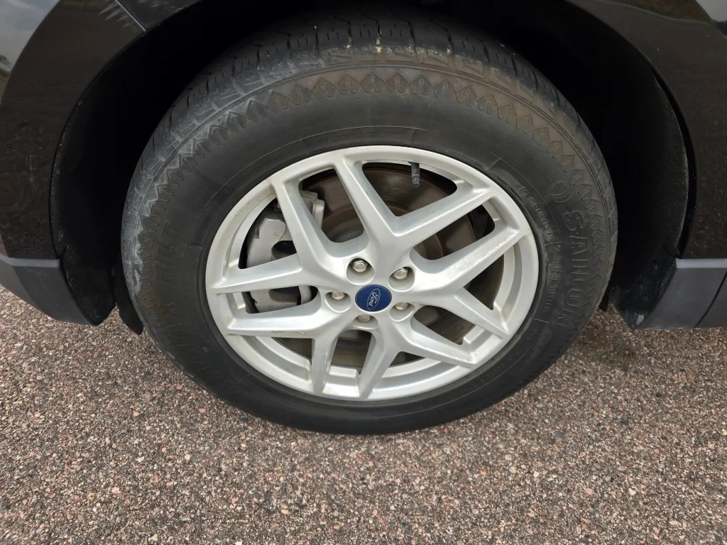 Used 2022 Agate Black Metallic Ford SEL image 9