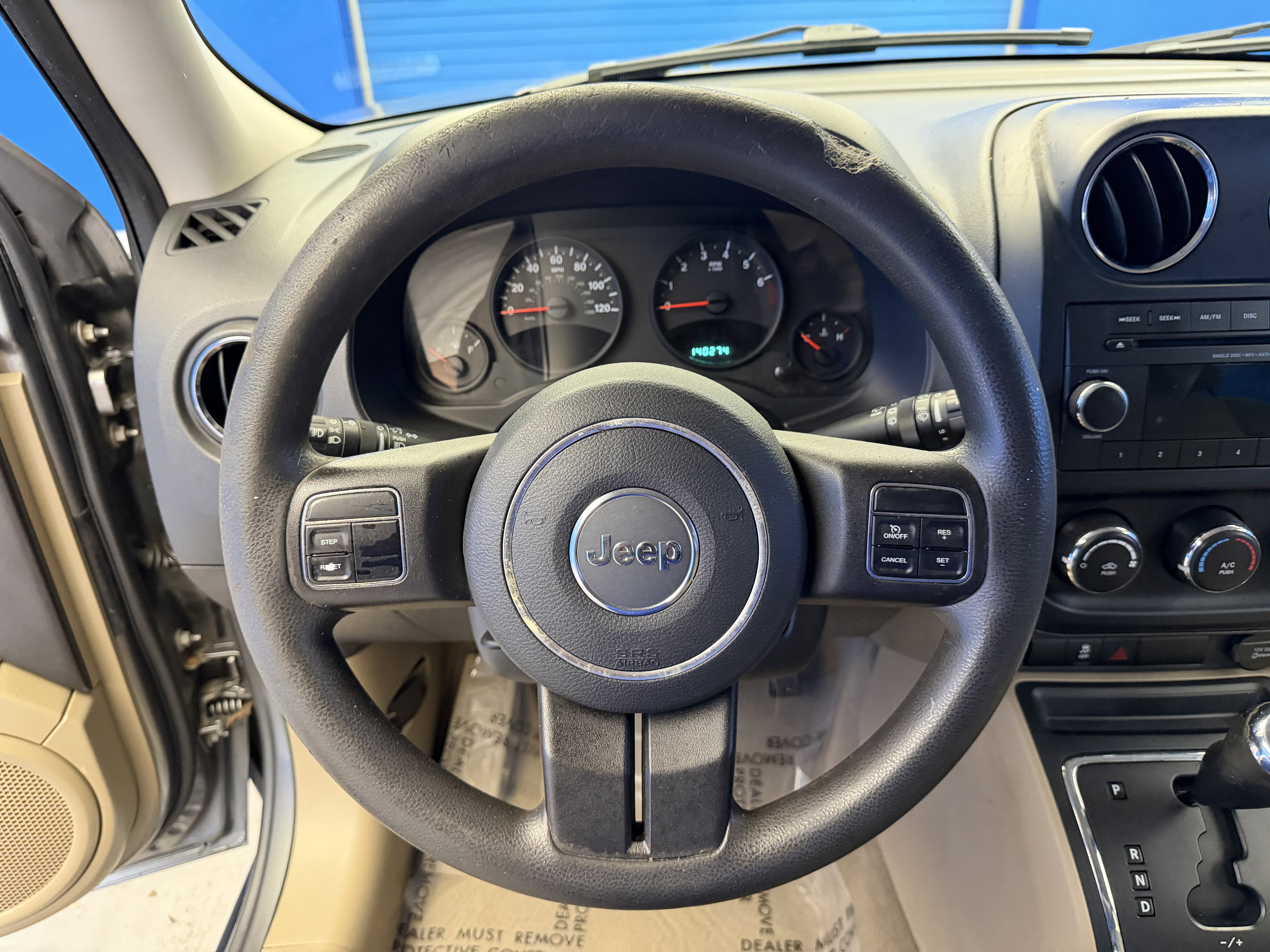 Used 2012 Mineral Gray Metallic Jeep Sport image 12