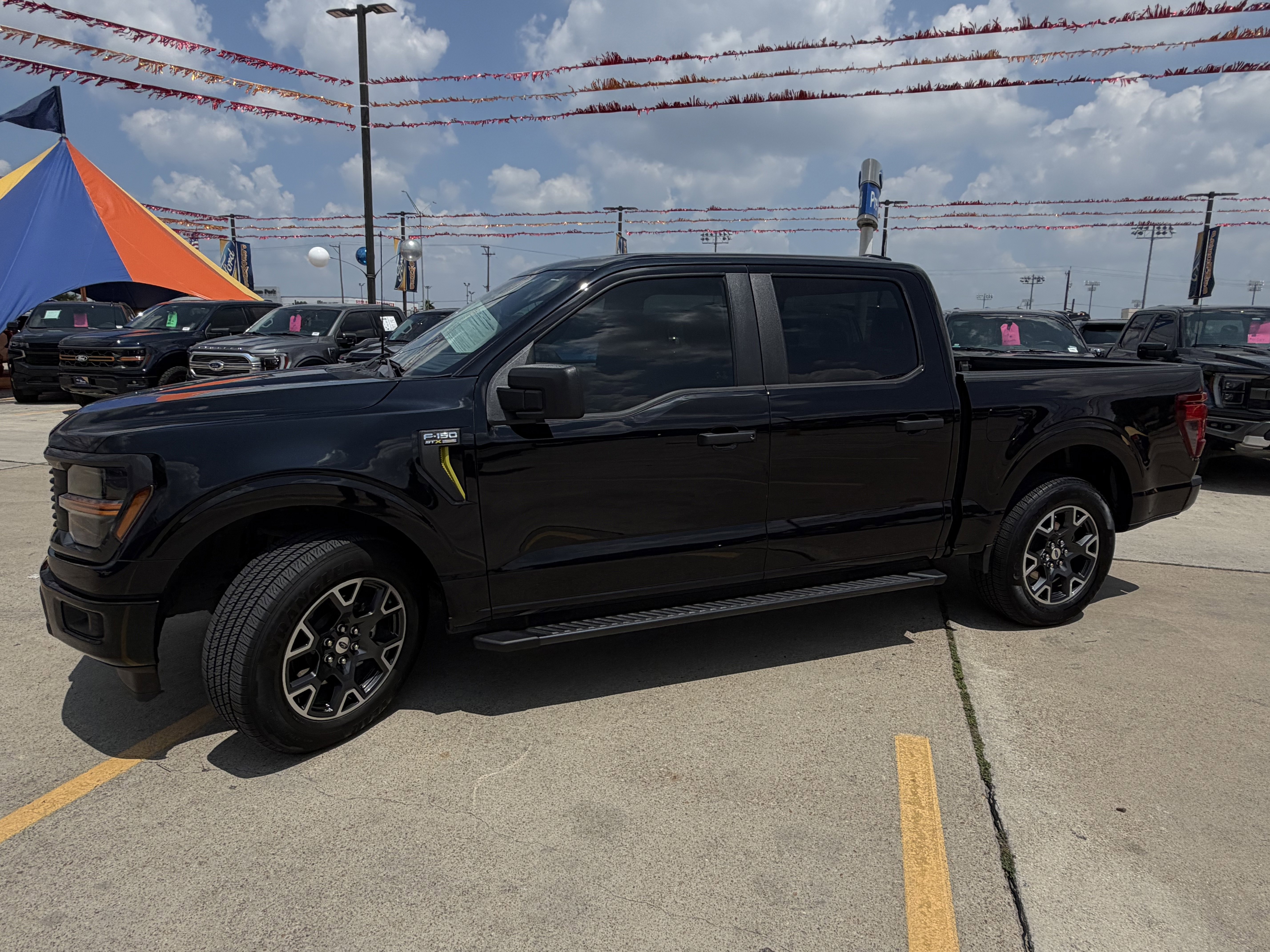 Used 2024 Agate Black Metallic Ford STX image 11