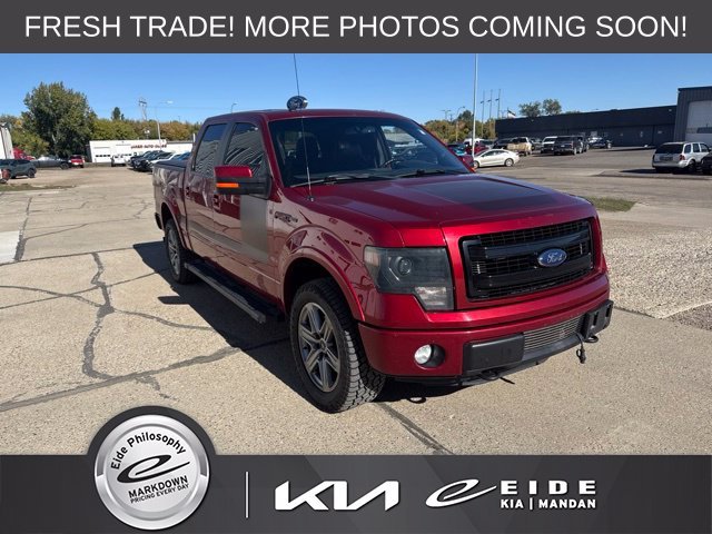 Used 2013 Red Ford FX4 image 1
