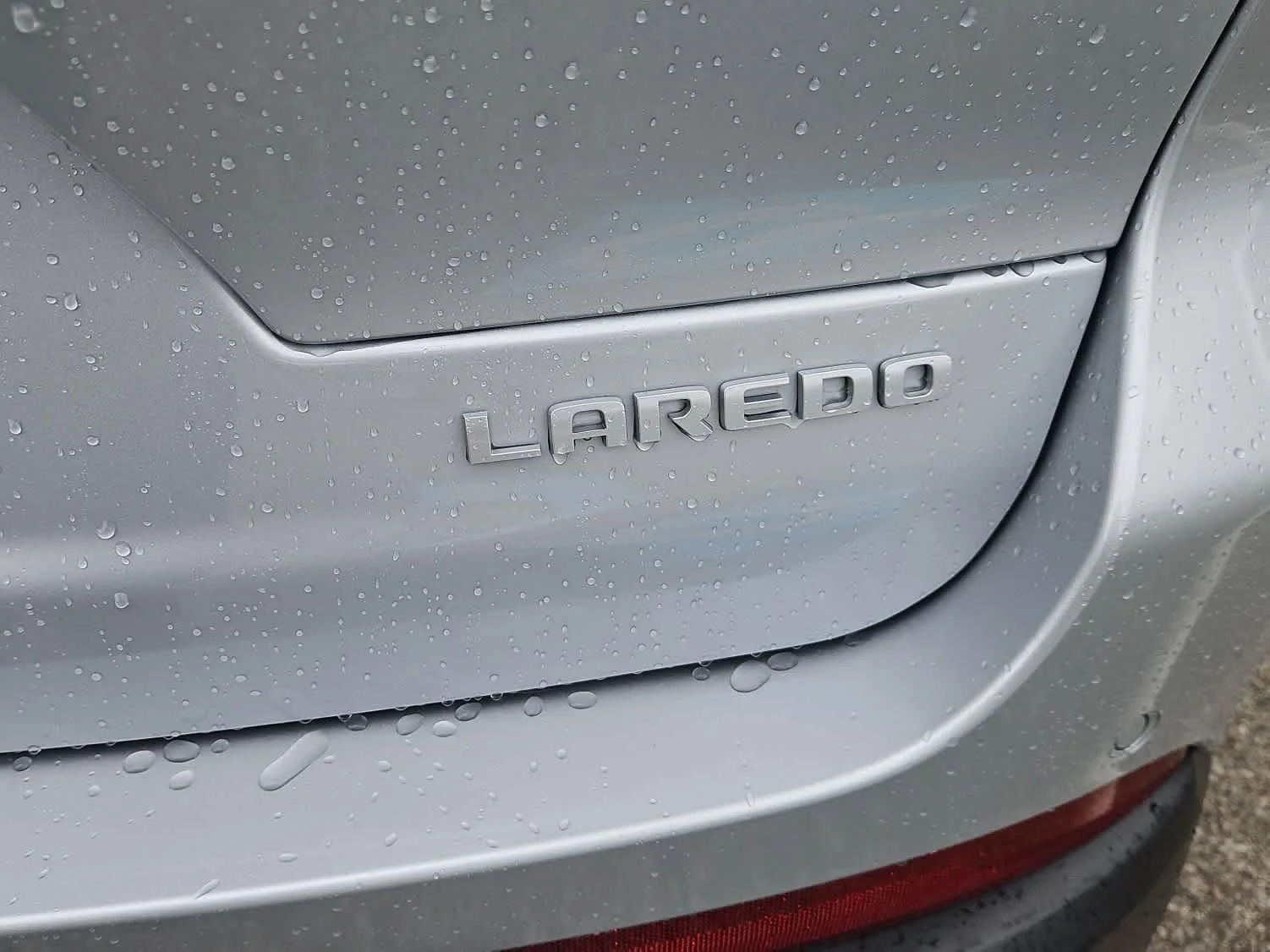 New 2026 Silver Zynith Jeep Laredo X image 11