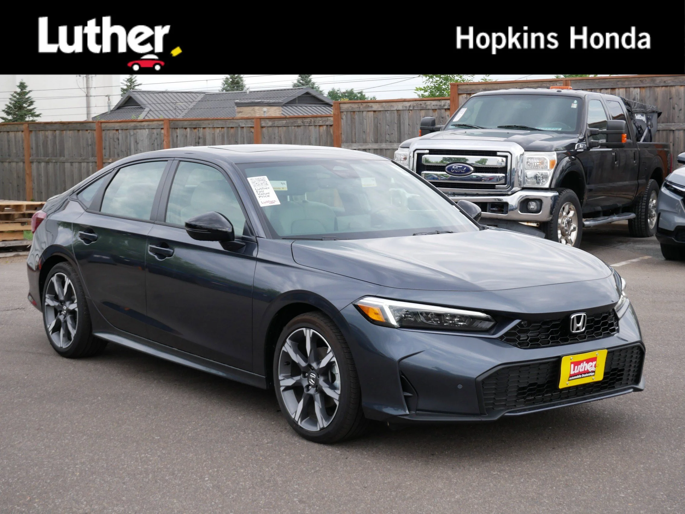 2026 Honda Civic Sport Touring Hybrid CVT's photo