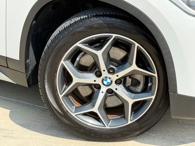 Used 2018 BMW X1 28i with VIN WBXHU7C35J5L09654 for sale in Leander, TX