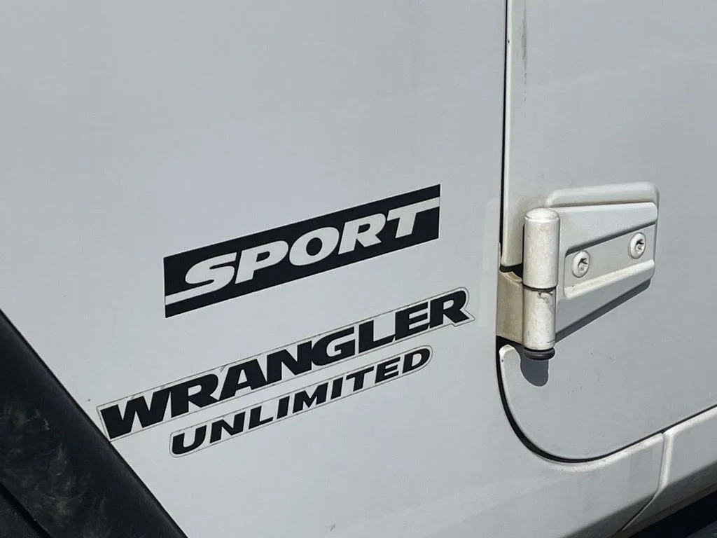 Used 2015 White Jeep Unlimited Sport image 9