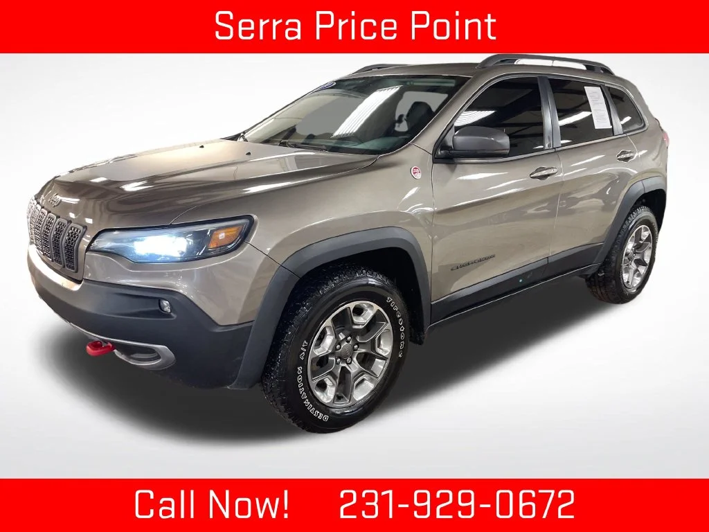 Used 2019 Beige Jeep Trailhawk image 1