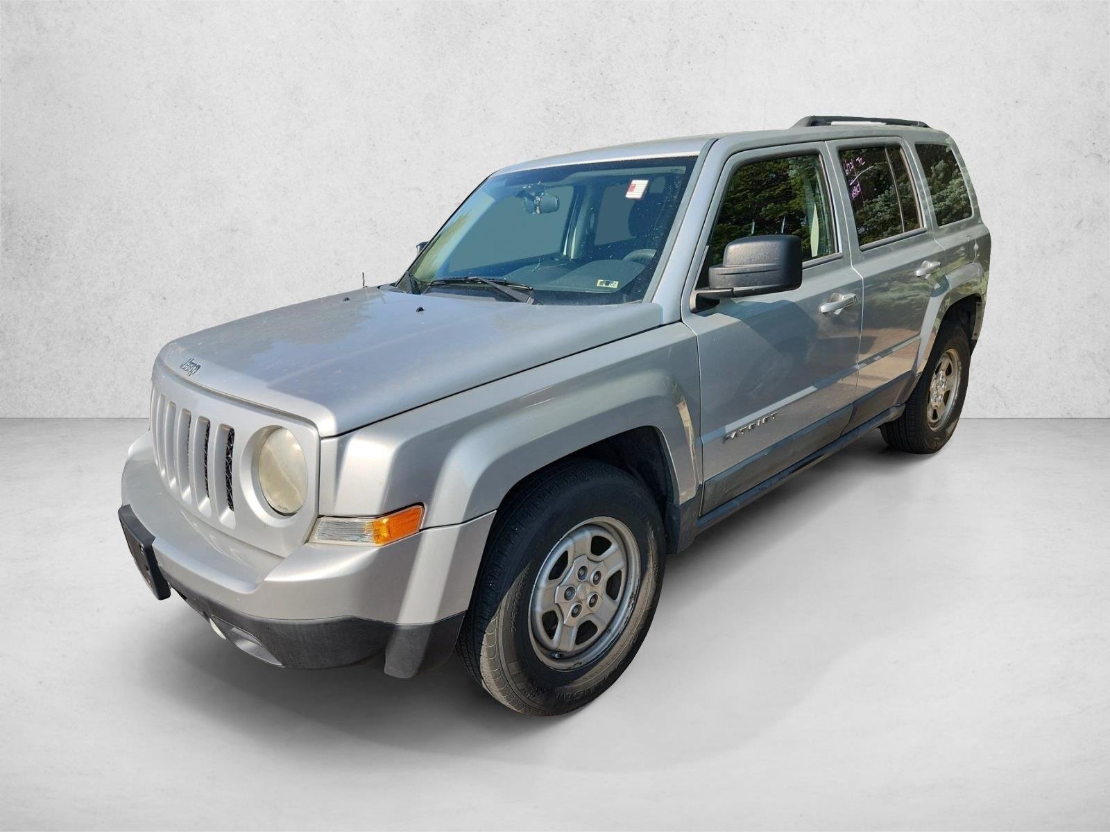 Used 2011 Bright Silver Metallic Jeep Sport image 14