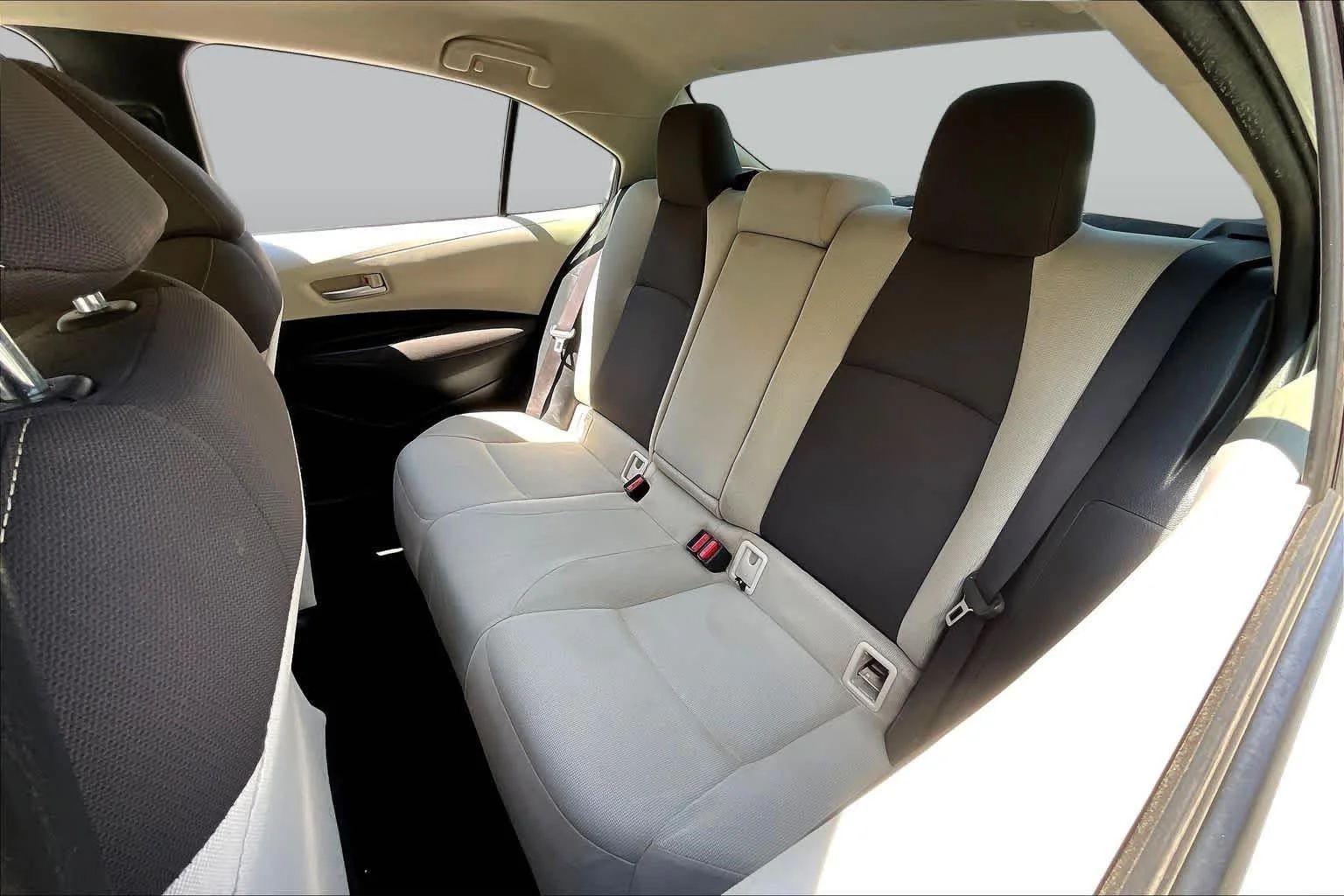 Used 2021 Super White Toyota LE image 19