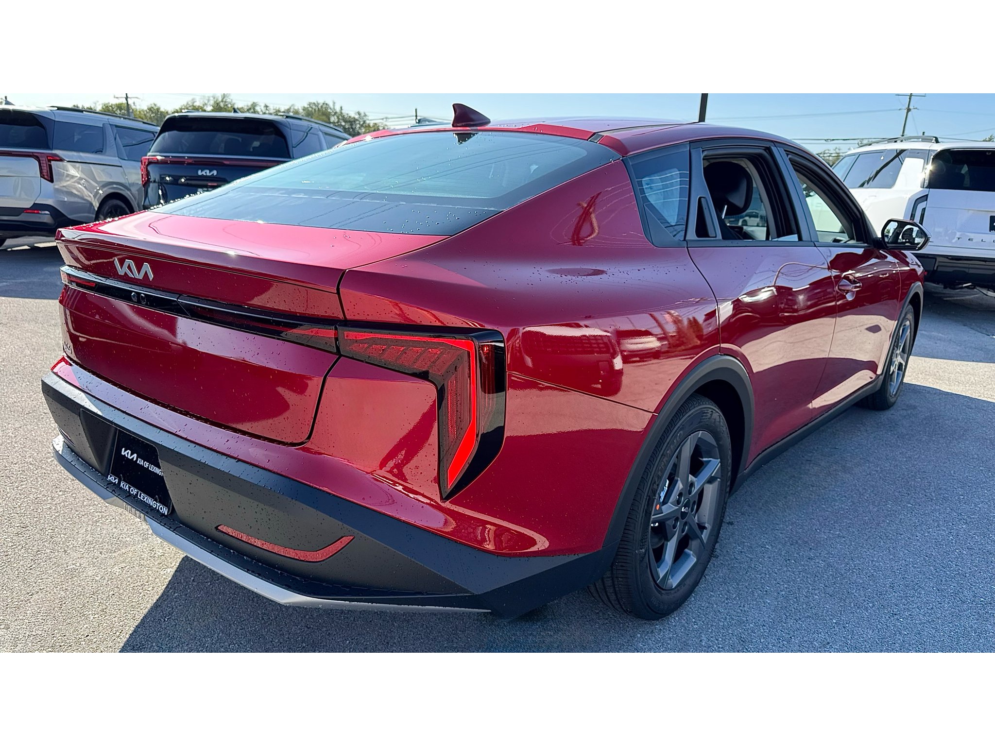 New 2026 Currant Red Kia LXS image 4