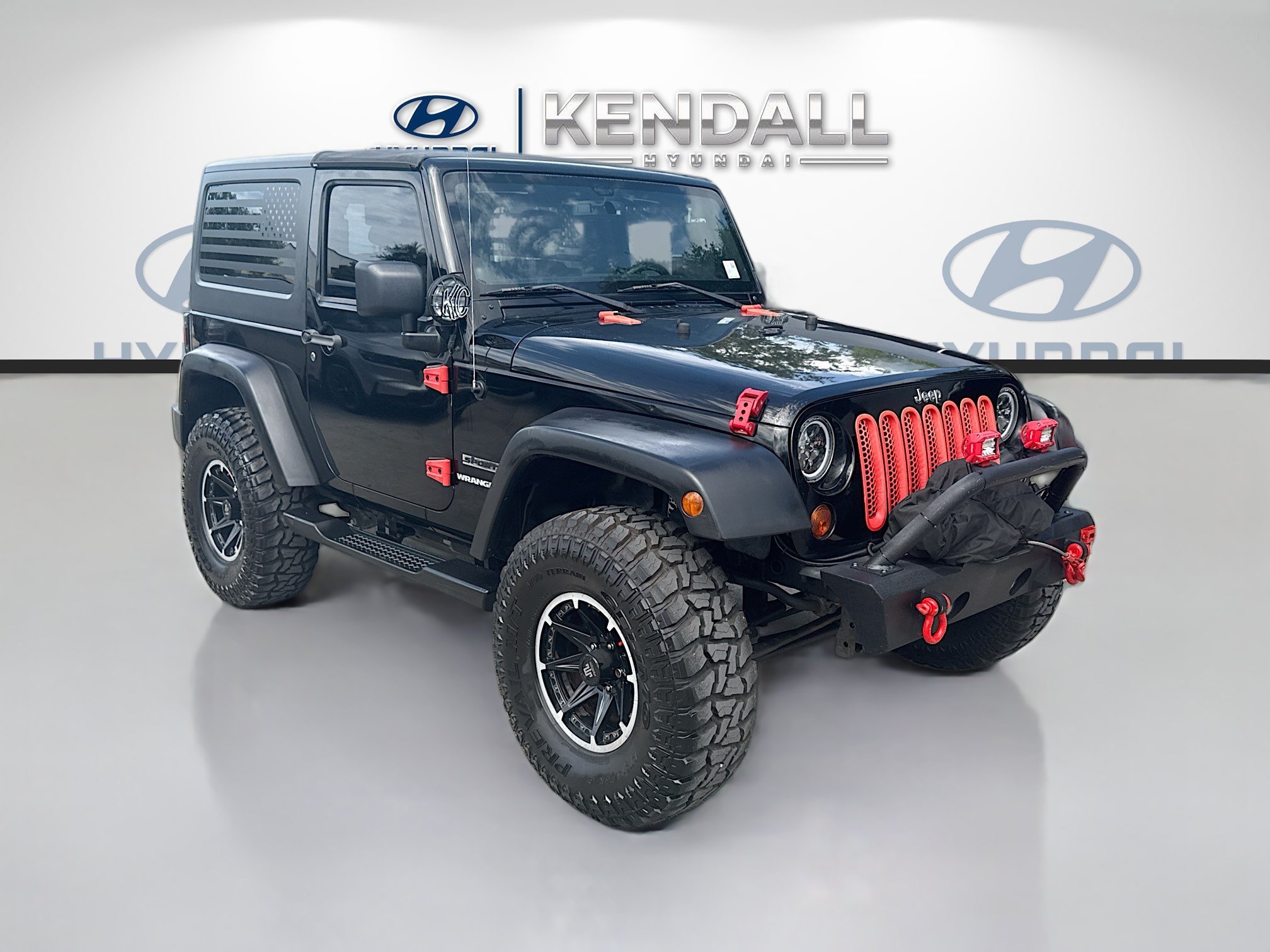 Used 2013 Black Jeep Sport image 1