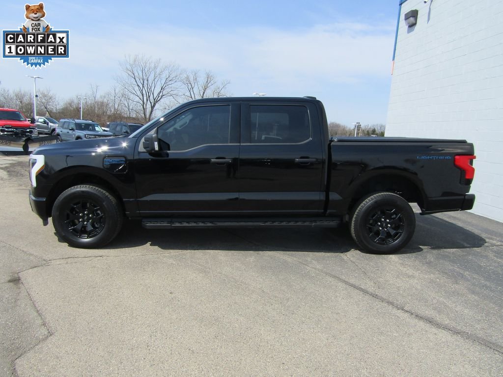 Used 2025 Ford F-150 Lightning XLT with VIN 1FTVW3LKXSWG05548 for sale in Racine, WI