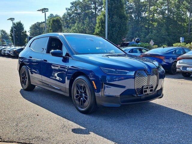 Used 2025 Blue BMW xDrive50 image 4