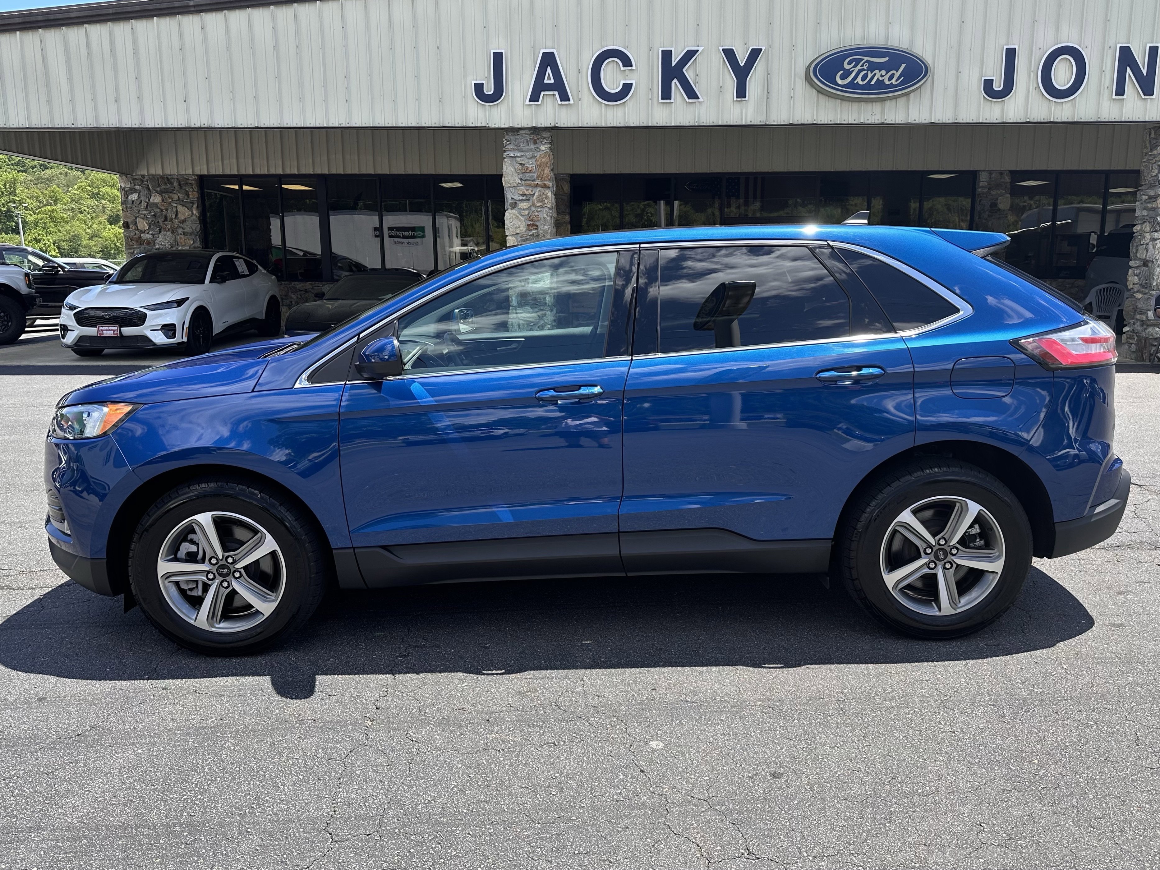 Certified Used 2024 Atlas Blue Metallic Ford SEL image 1
