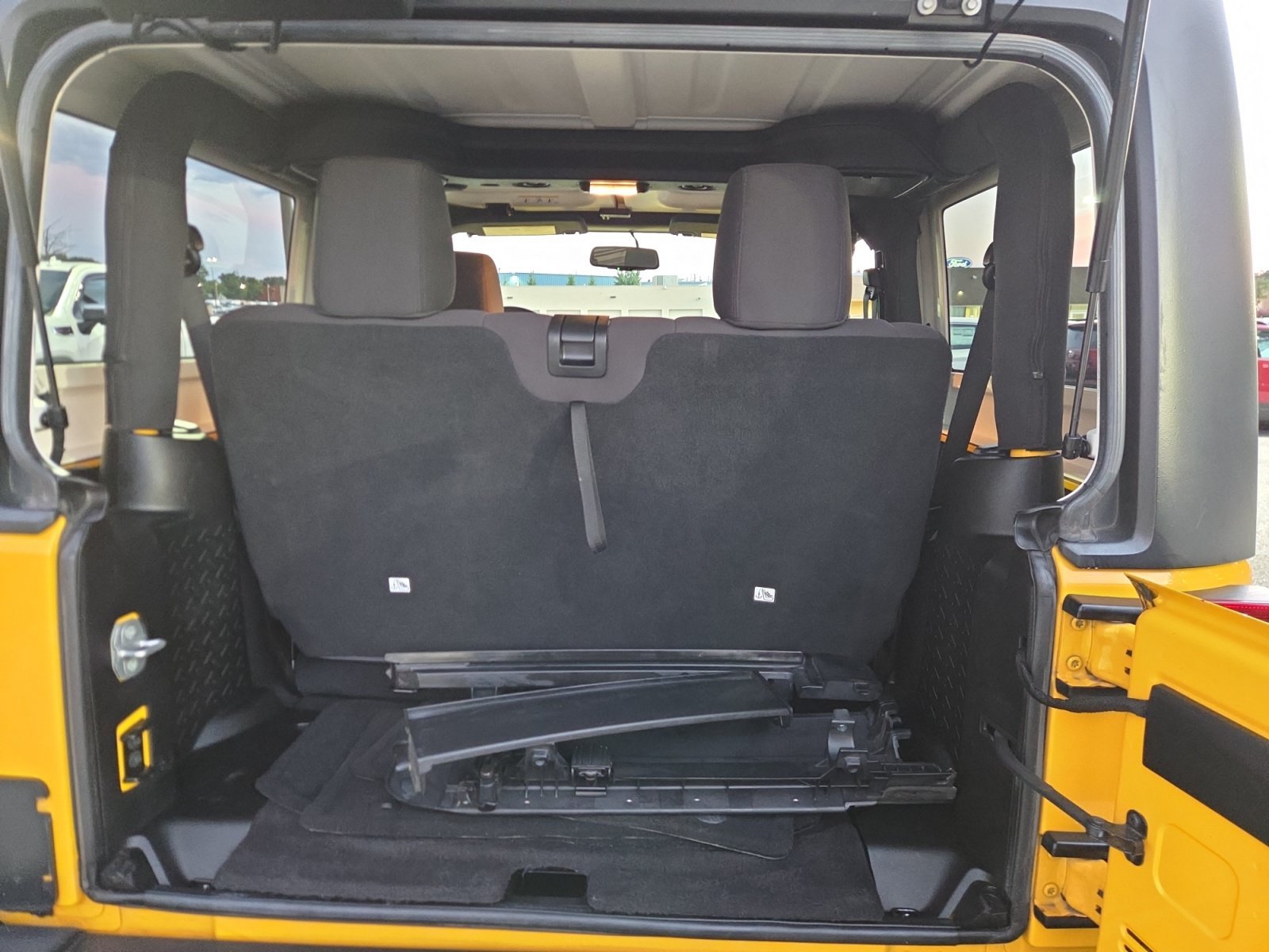 Used 2015 Baja Yellow Clearcoat Jeep Sport image 17