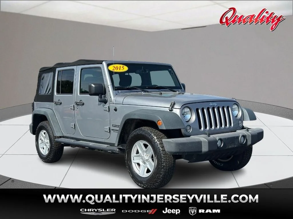 PRE-OWNED 2015 JEEP WRANGLER SPORT